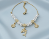 0133  Bransoletka elegancka złota zaciągana pozłacana 14k perły delfin muszelka